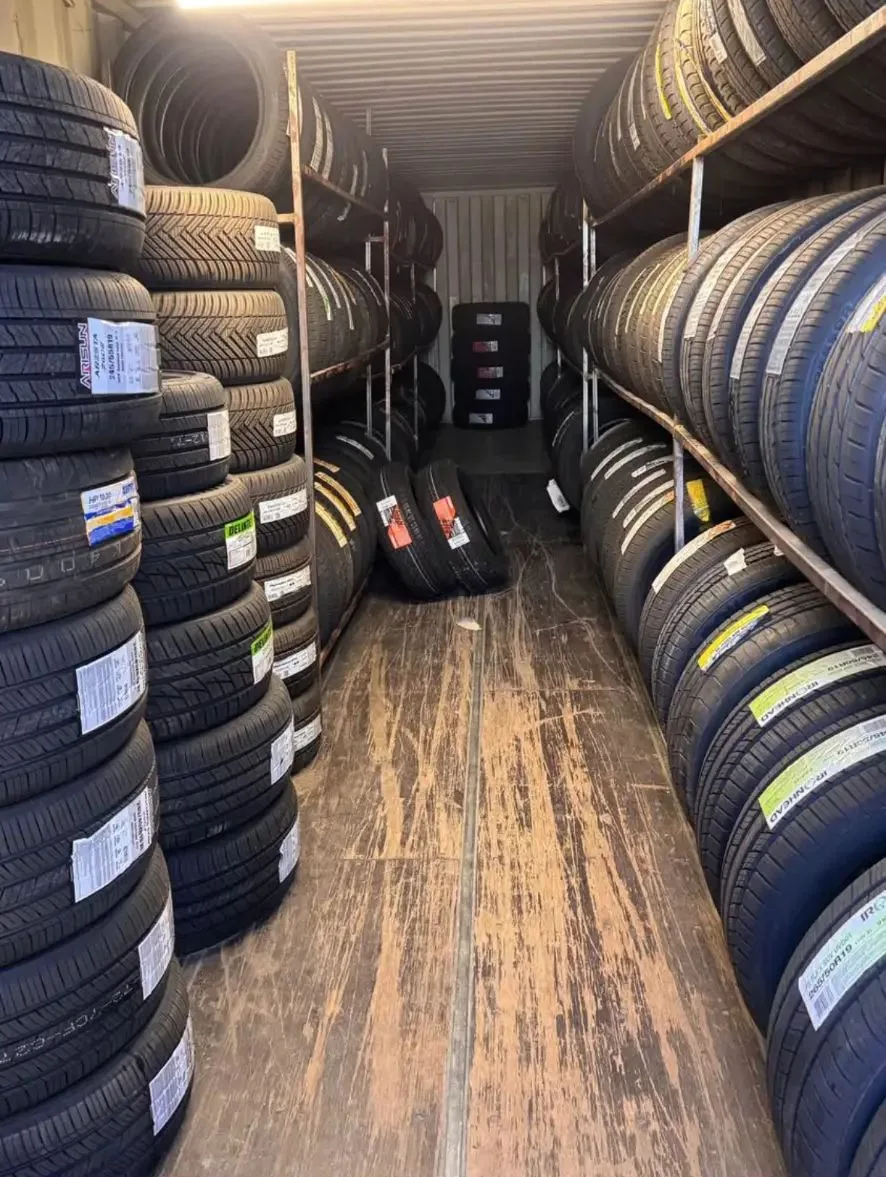 Tire storage lined with new passenger tires